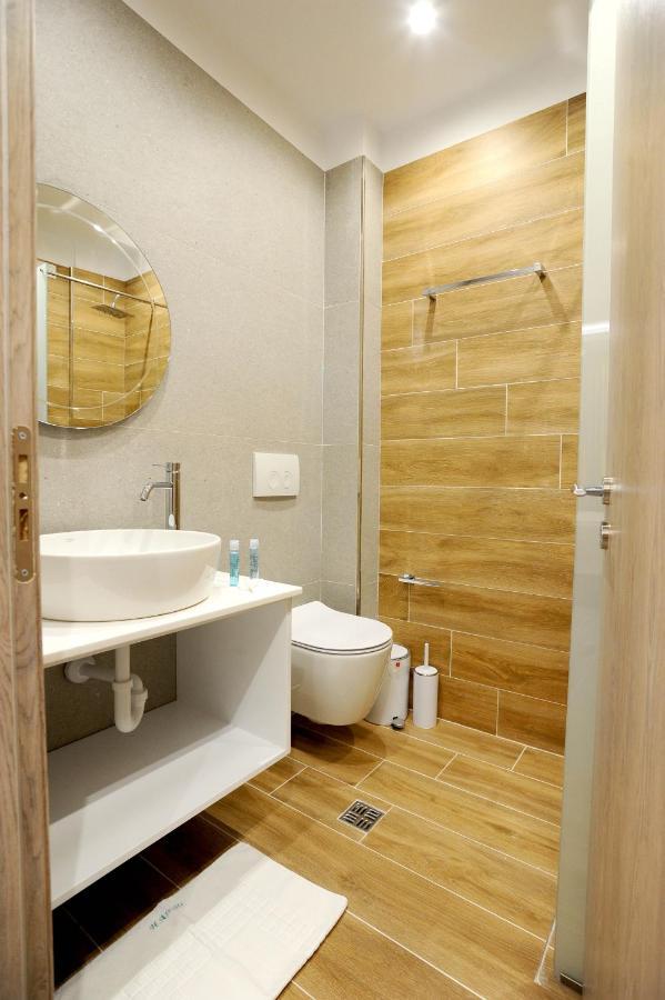 Afrodite Suites Sarande Bagian luar foto